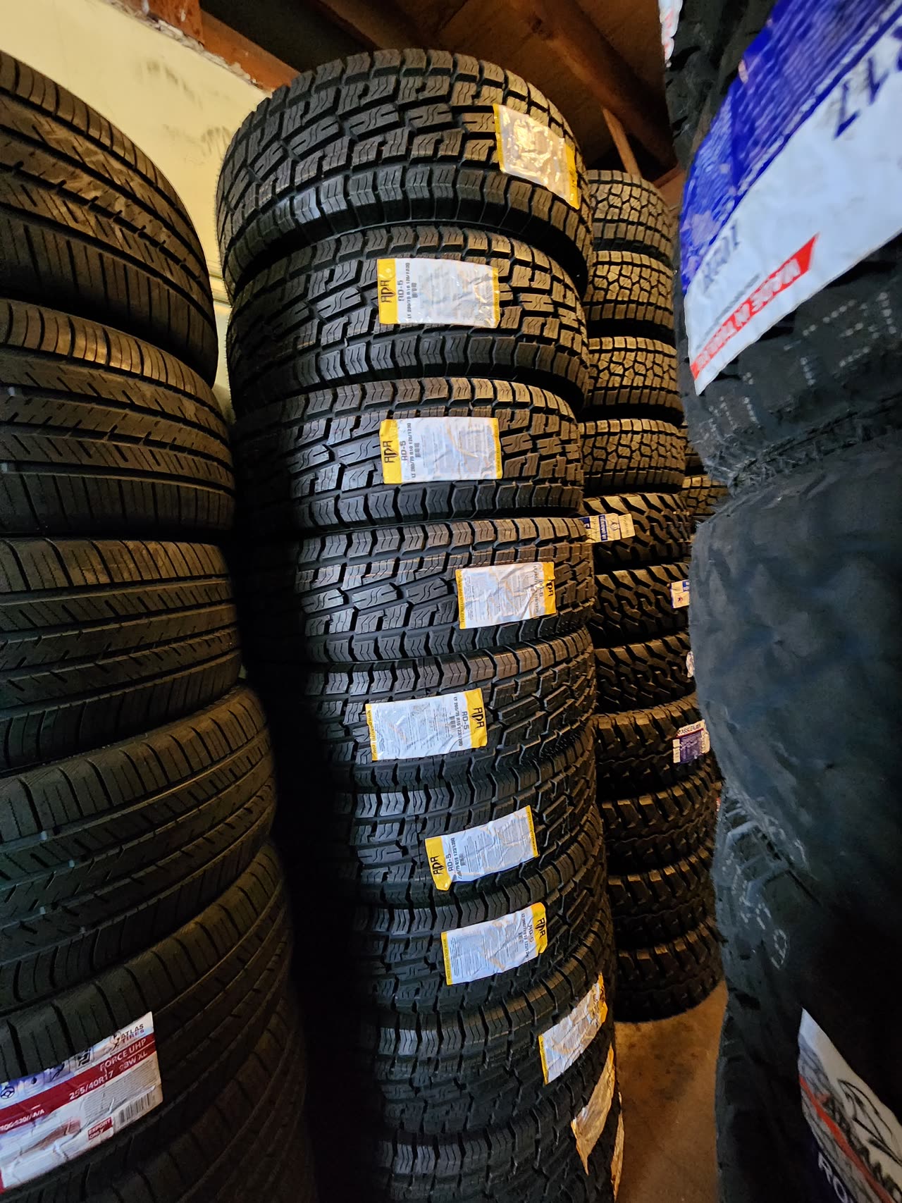 Tire work on the shop floor at Garcia Wheels & Tires